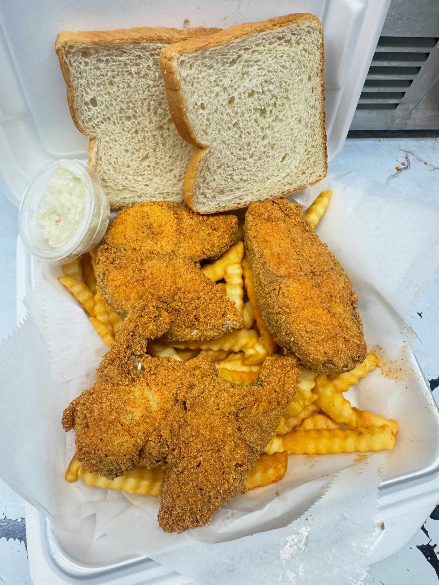 Jackson Grill fried fish combo with fries and bread